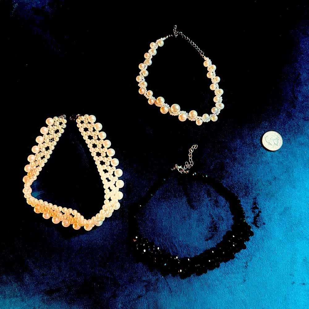 Faux pearl and black beads chokers.